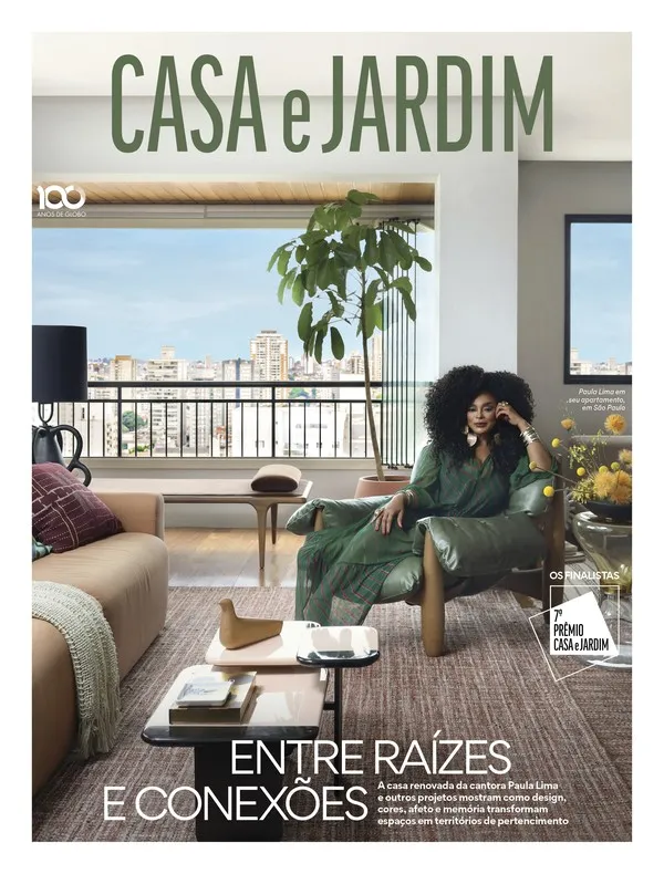 happy mature german man using online banking laptop home