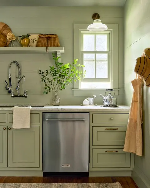 elderly couple planning retirement finances at kitchen table