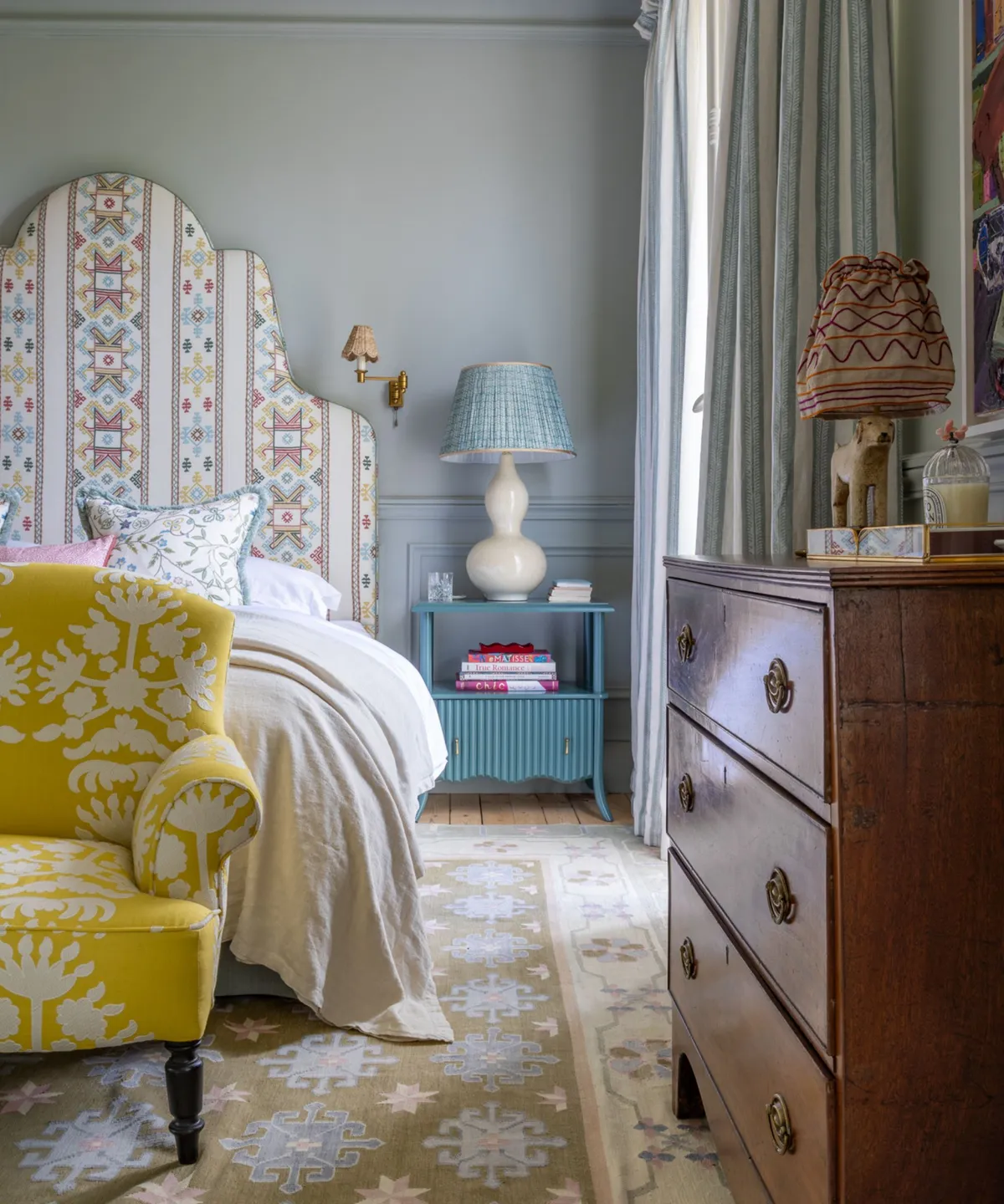 young woman checking weather forecast on smartphone while walking in rain germany