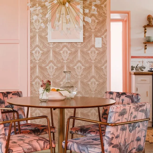 couple laughing together couch home