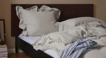 students comparing handwritten and digital notes in german classroom