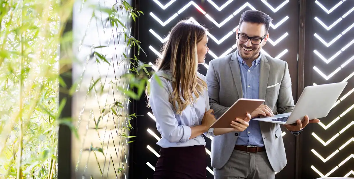 business person using tablet for learning in modern office setting