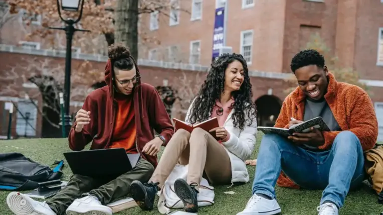 relaxed German students studying for final exams outdoors
