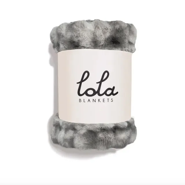 woman applying olive oil on face winter