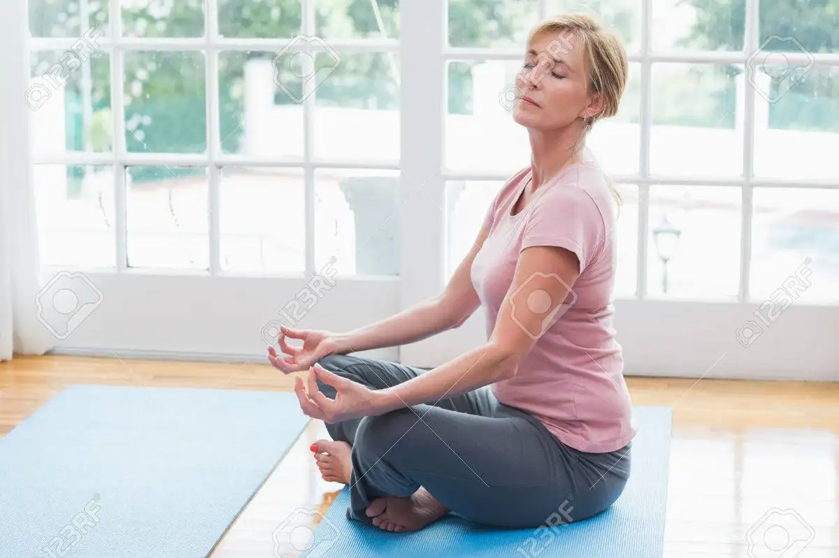 Yoga mature woman happy home sun